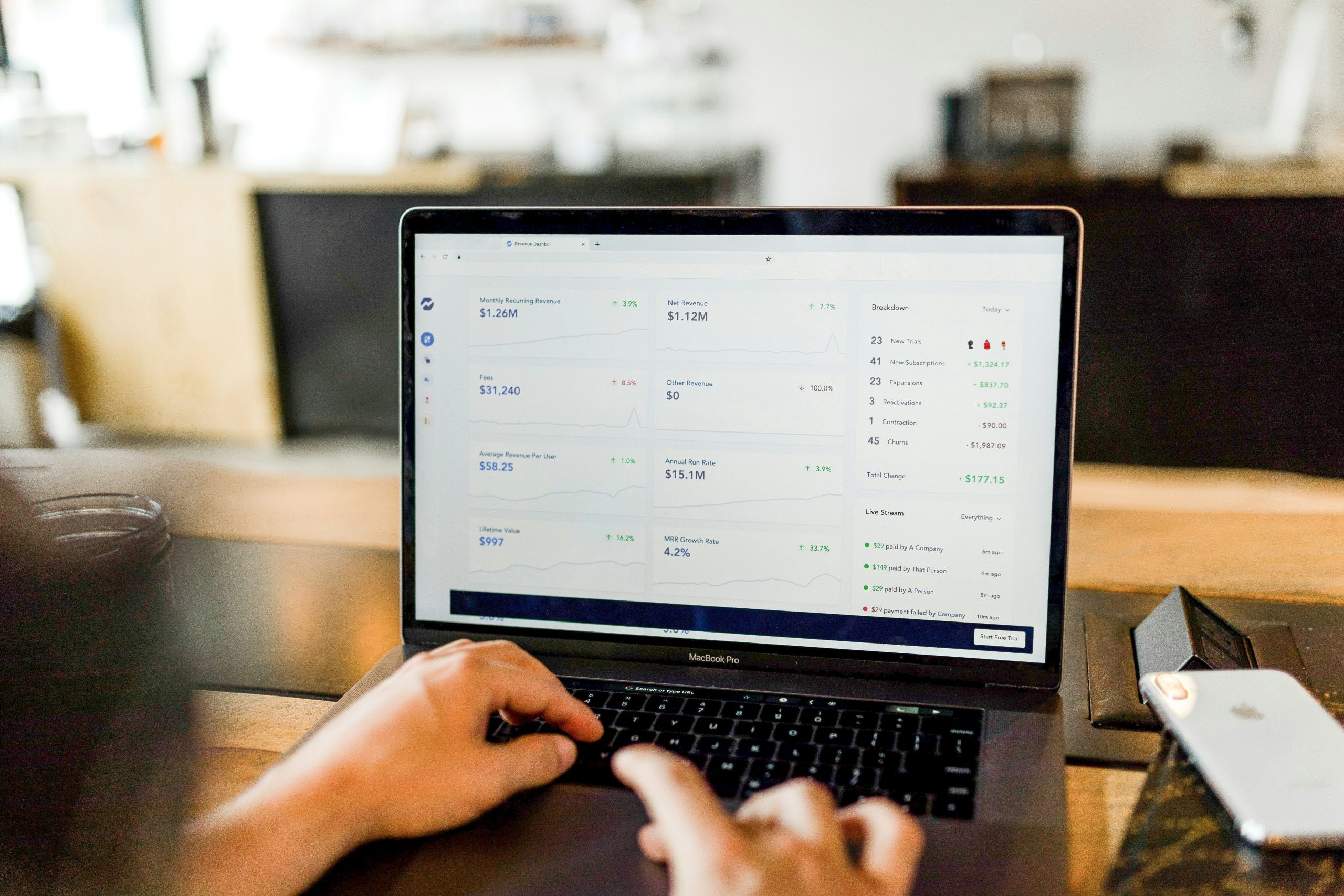 laptop showing figures on a screen